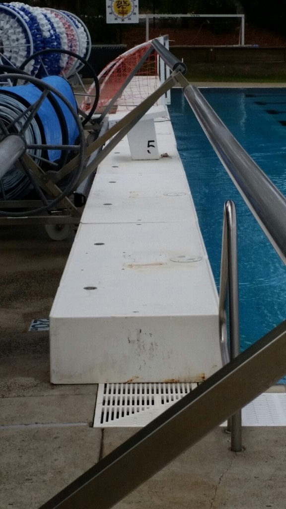 Commercial pool rollers for 50m pool in use