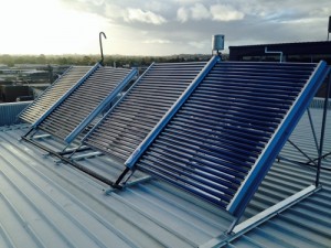 Greenhouse heating evacuated tubes