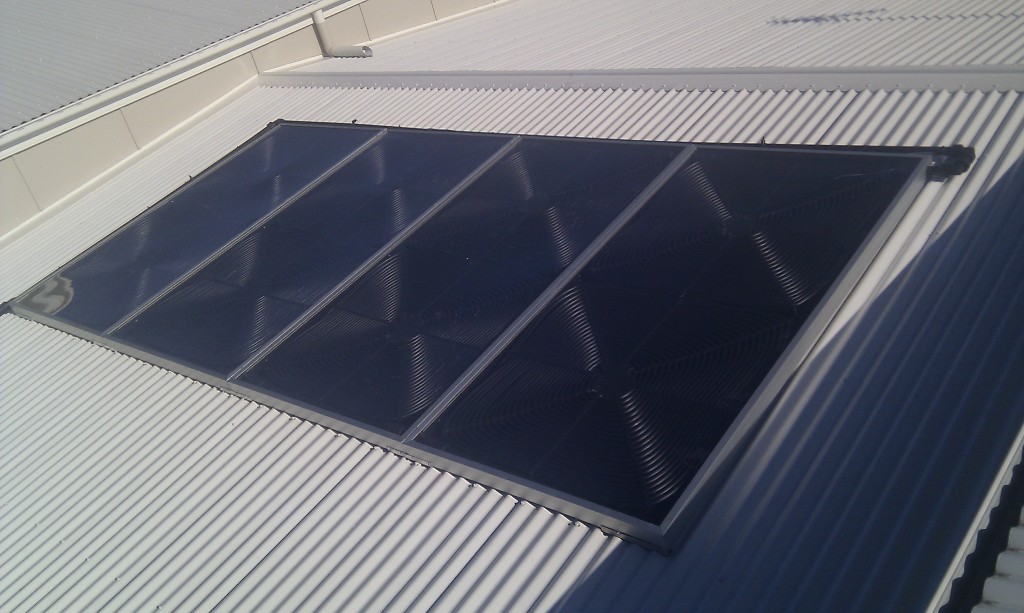 Four Solartherm panels on a metal roof Four Solartherm panels on a metal roof