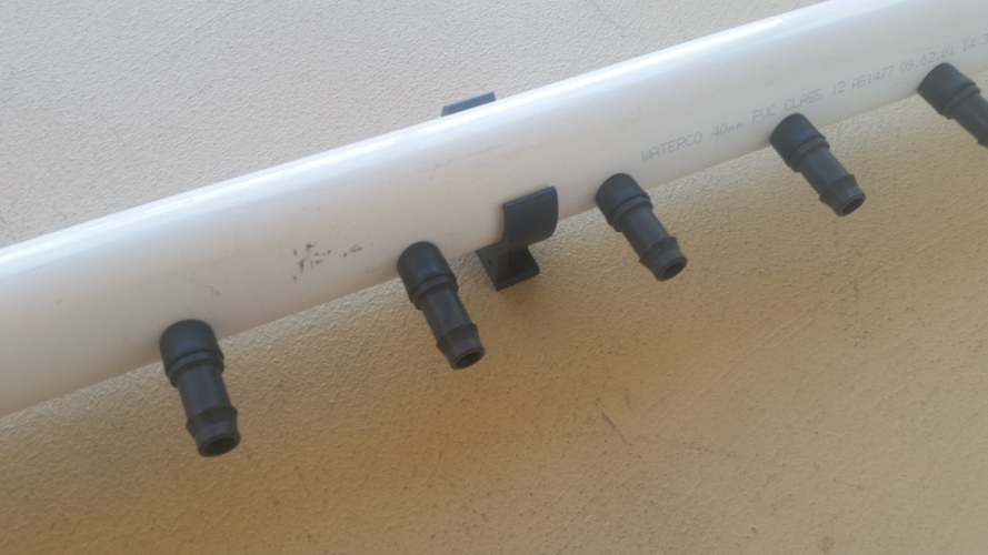 Tubing manifold made to suit your roof