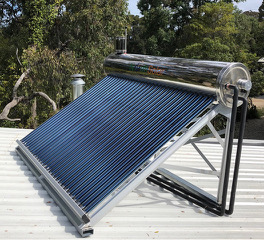 300 litre 30-tube solar hot water system showing wood stove connections